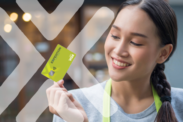 Girl holding card