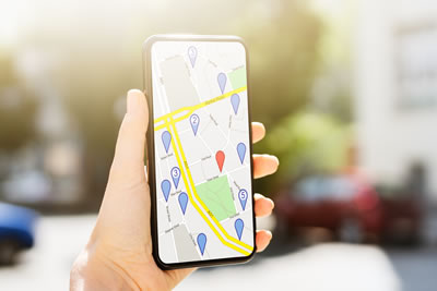 person looking at map on phone